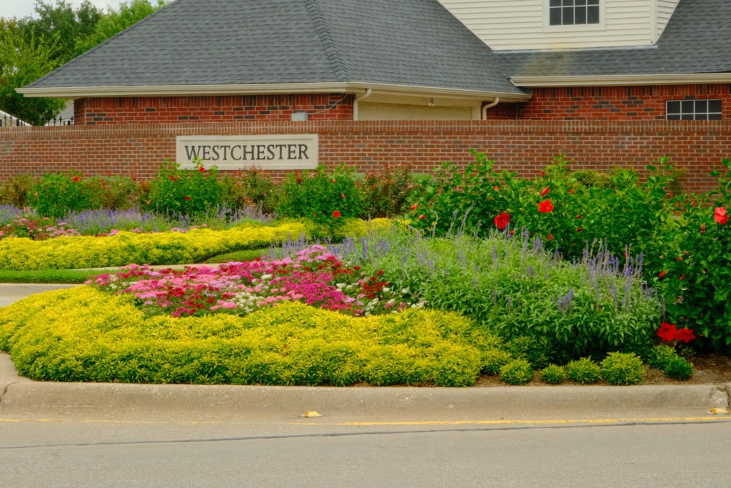 Professional flower bed enhancements at Westchester community in DFW