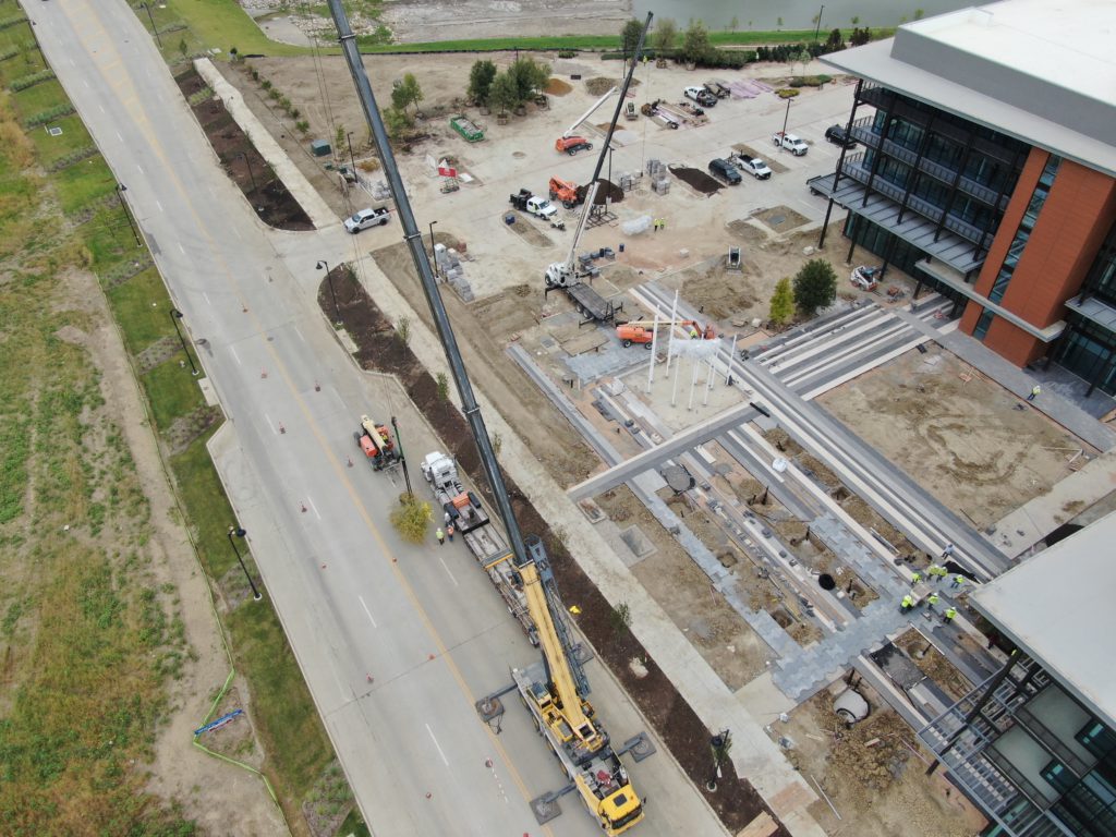SLD installing large trees by crane for a commercial landscape project in Coppell, Texas.