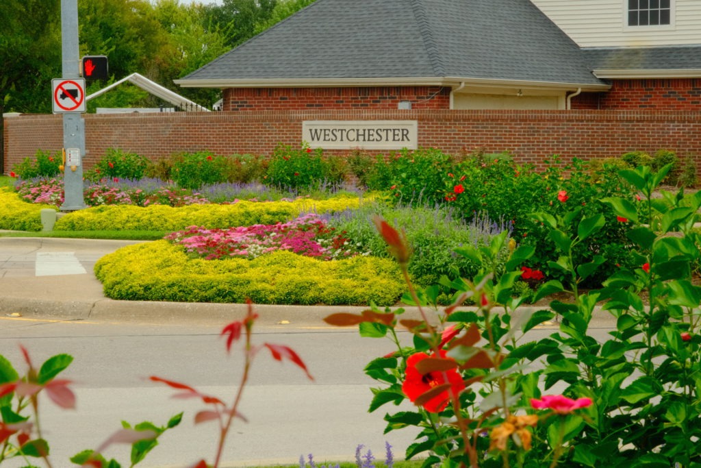 Professional flower bed enhancements at Westchester community in DFW