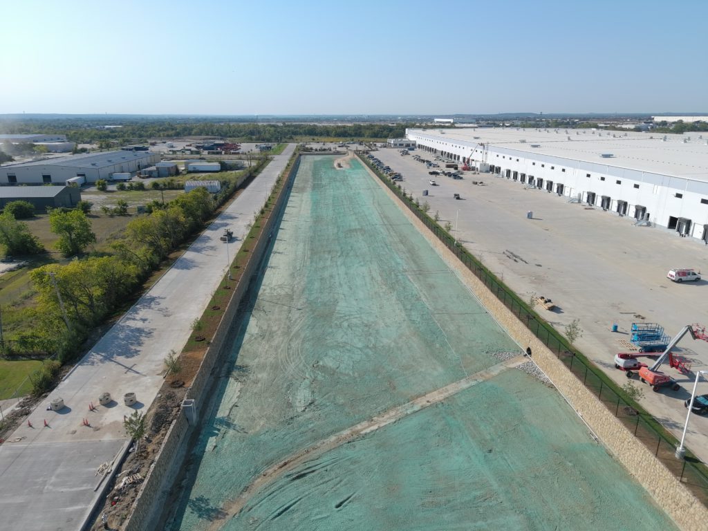 Hydromulch application across a large commercial parking lot project in the DFW area.