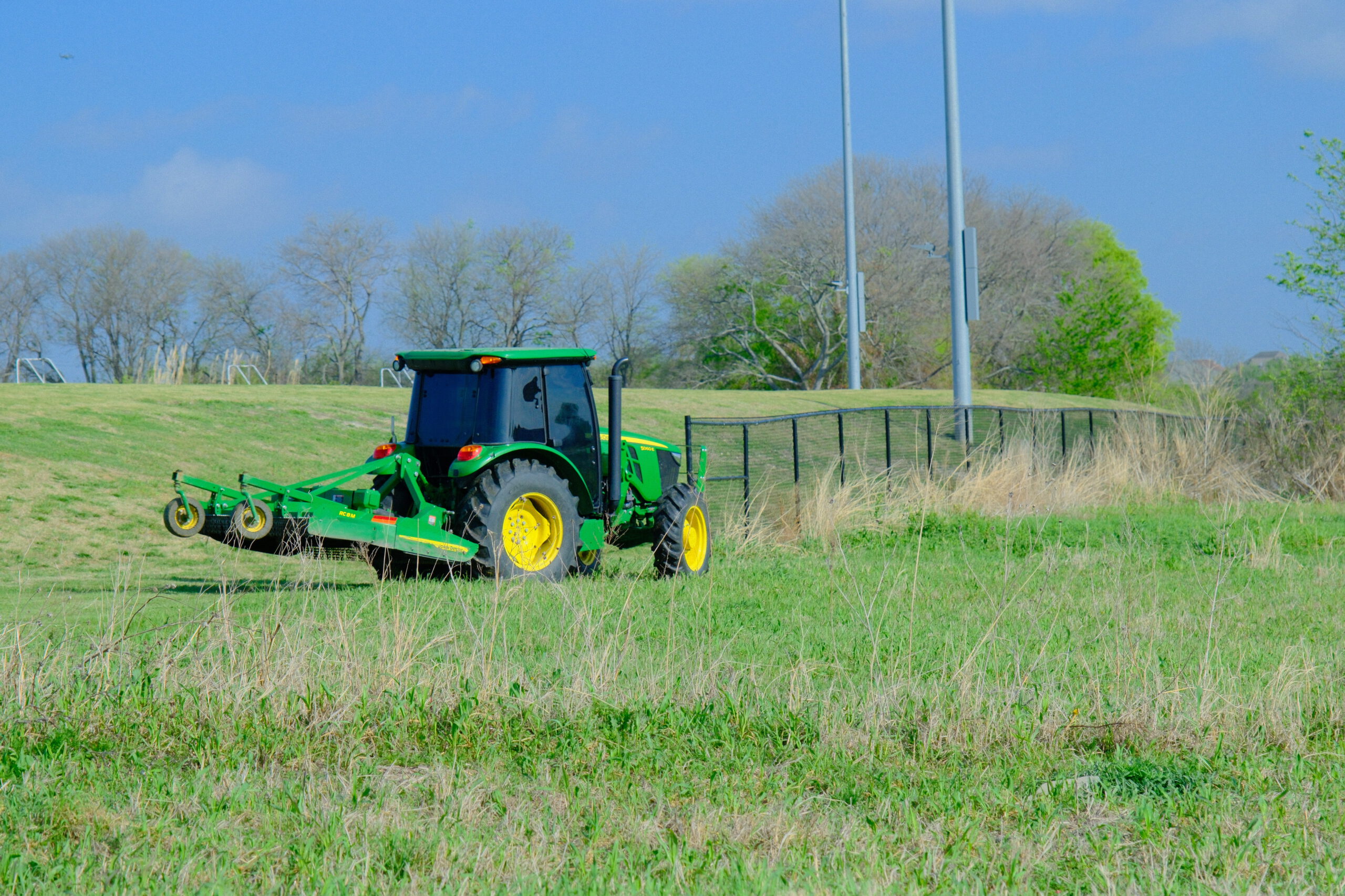 Field mowing at HOA community in DFW
